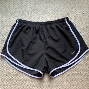 Gray and white Nike running shorts (L)